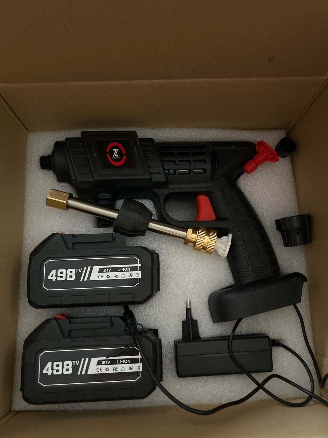 Con sus dos baterías y el cargador, foto de un comprador